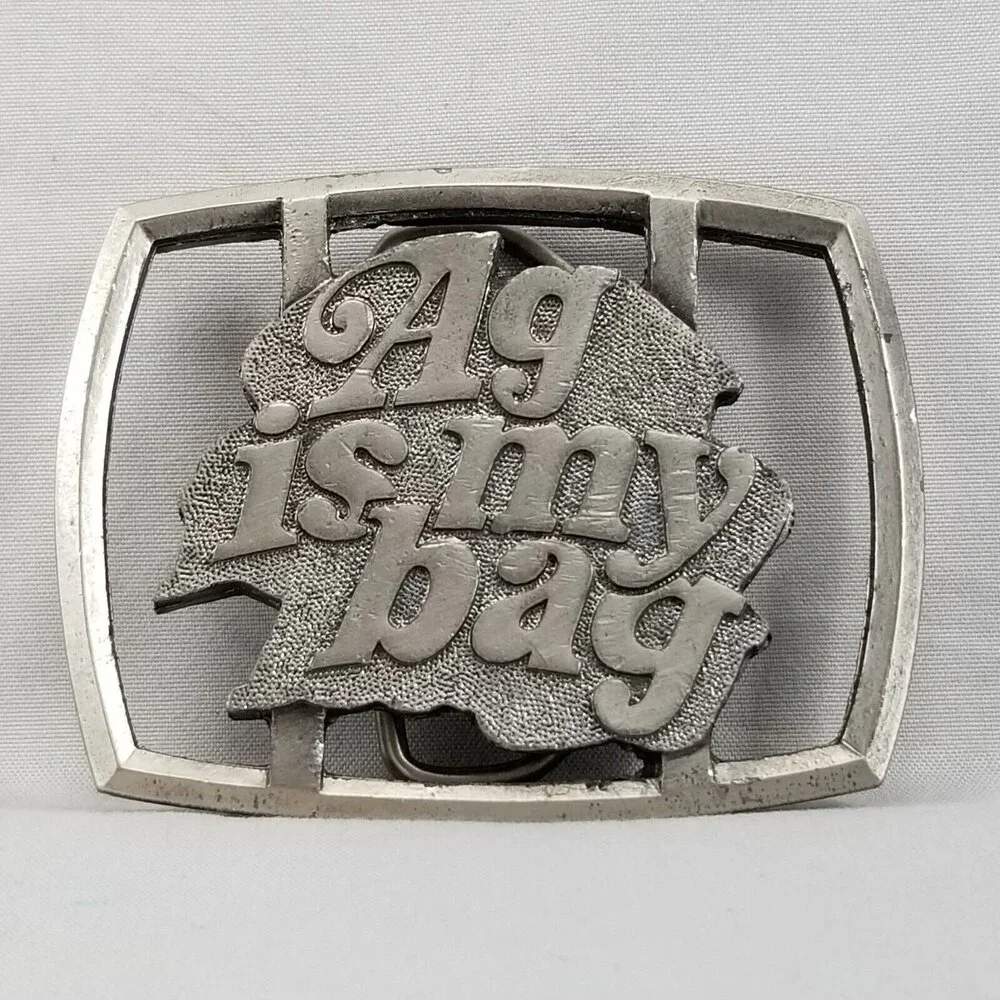Vintage Belt Buckle 1977‎ Reiman Publications 